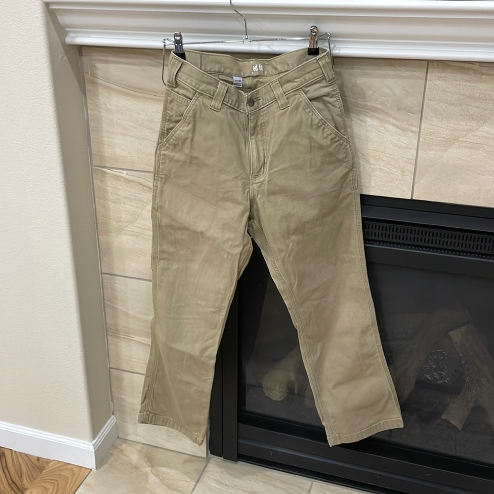 tan carhartt cargo pants in original size of 31/30, altered to fit 29” waist